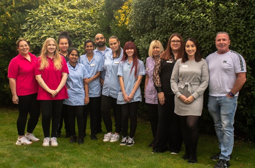 Carlton House staff team standing together